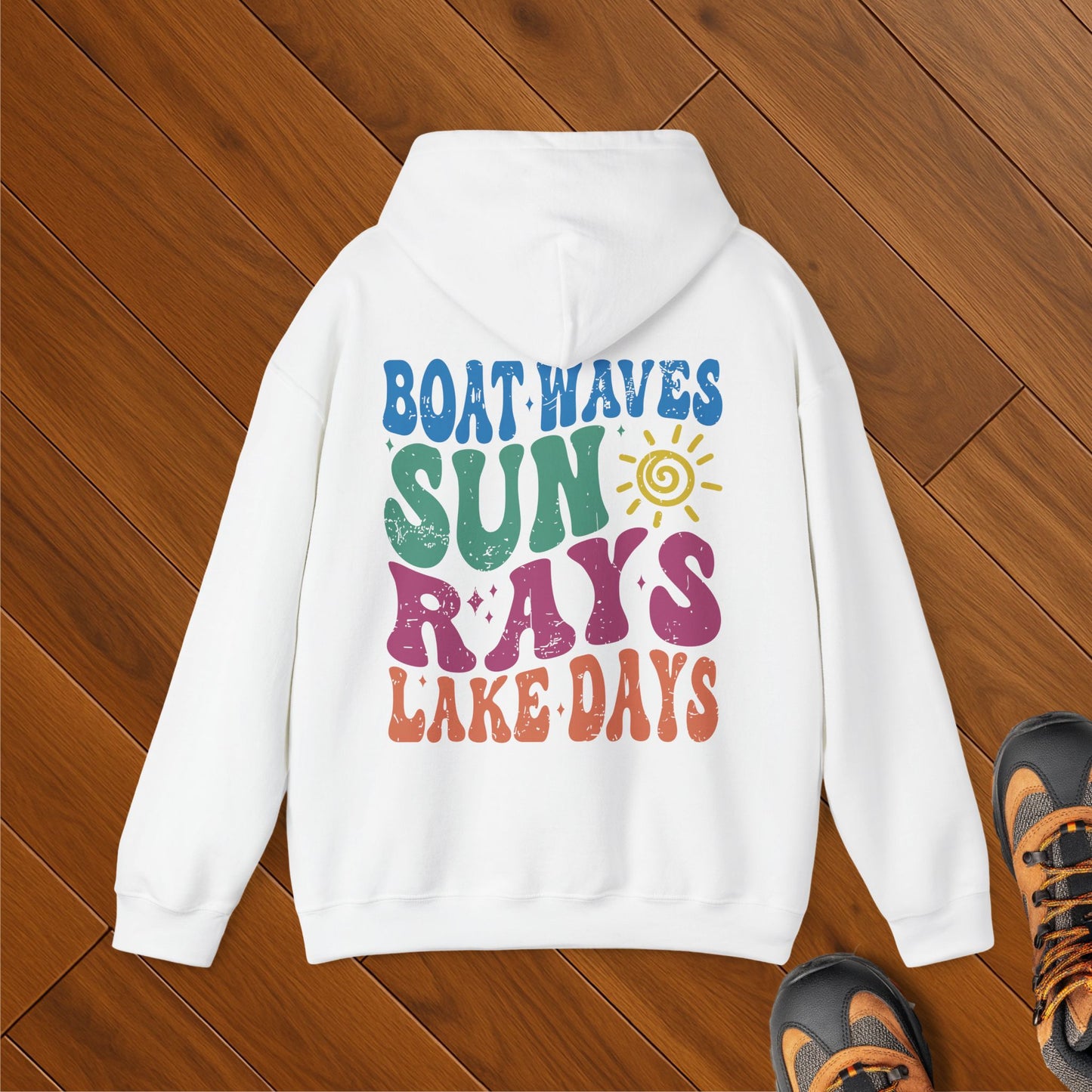 White hoodie with colorful retro text reading "Boat Waves Sun Rays Lake Days" – perfect gift for lake and boat lovers