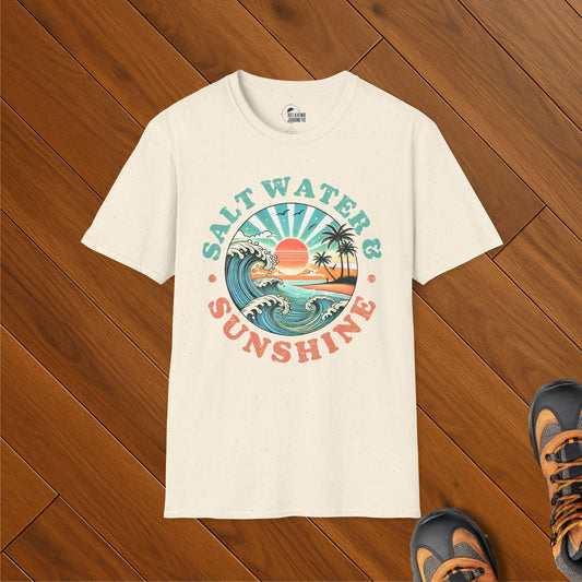 Cream t-shirt with vintage-style graphic of ocean waves, palm trees, sunset, and text reading “Salt Water & Sunshine”