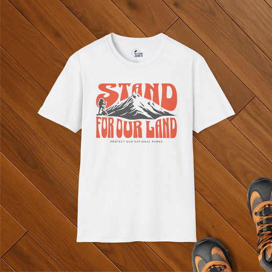 "Stand for Our Land" t-shirt with mountain silhouette and hiker graphic, advocating to protect national parks and public lands