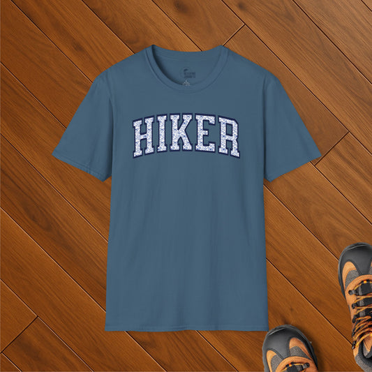 Blue t-shirt with bold university-style text reading “HIKER” filled with scenic toile pattern
