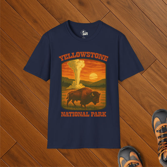 Navy t-shirt with vintage-style illustration of a bison in Yellowstone National Park at sunset with Old Faithful geyser erupting in the background